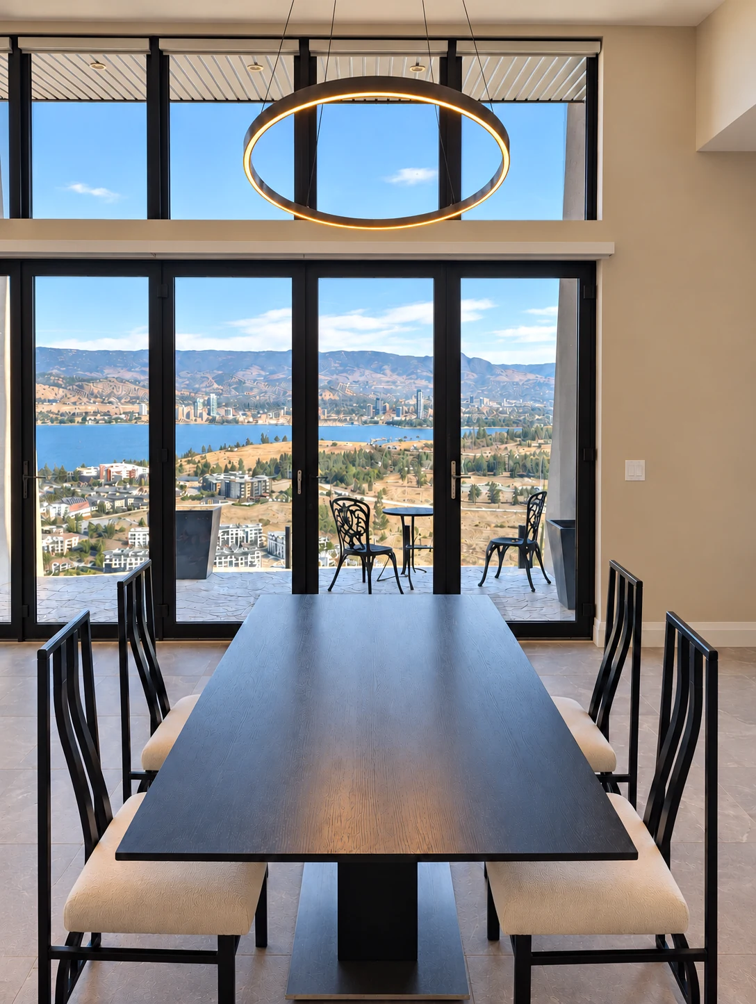 Suspended dining room LED light in a West Kelowna home